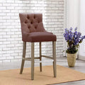 Tabouret de bar à dossier boutonné, rembourré en lin